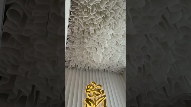 Architectural ceiling design with integrated lighting 