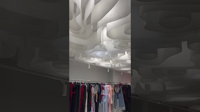 Wave ceiling in the showroom in Moscow on Patriarch's Ponds 