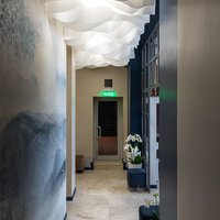 Drop Stripe paper ceiling in a hotel corridor 