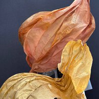 Large bronze-colored leaves installations 