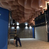 Decorative suspended ceiling for a movie theater 