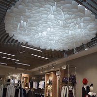 Suspended Wave Ceiling in the design of children's clothing store 