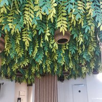 Office ceilings adorned with green foliage 