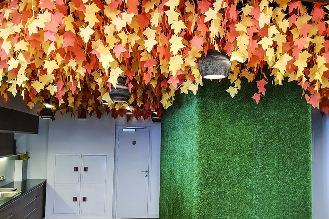 Autumn leaf fall in the design of the Avito office 
