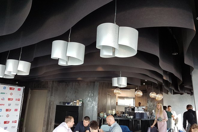 The flame-retardant black ceiling in the Panoramic bar, designed by Alyona Skovorodnikova 