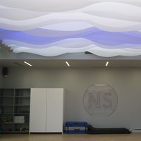 Installation of Drop Stripe® suspended ceiling in a fitness club in Moscow 