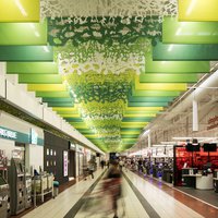 Yellow and green lamellas for shopping center interiors 