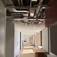 Example of an office ceiling with exposed communications. Ekaterina Fadeeva Studio, HeadHunter office 