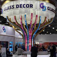 Exhibition stand visible across the hall 